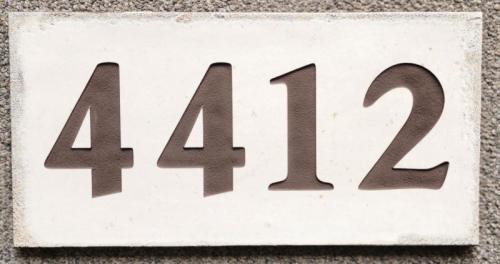 House plaque engraved on tile 