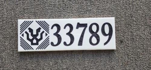 Decorative house plaque engraved on tile 