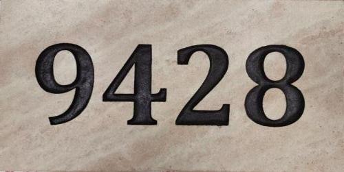 House plaque engraved on tile 